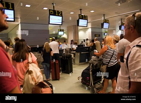 Ibiza Airport Checking in at Departures - Ibiza Stock Photo - Alamy