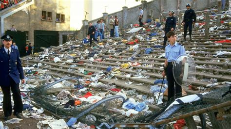 Spectators flee the Heysel stadium disaster which killed 39 and injured ...