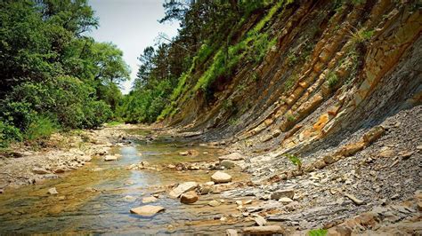 Mountain River Eroding A Cliff wallpaper | nature and landscape ...