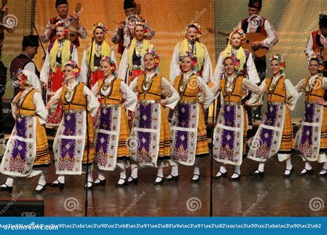 People in Traditional Folklore Costumes Perform Folk Dance Bulgarian ...