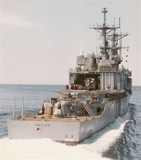 Stern view of USS Hayler (DD 997) as she departs Portland, ME on sea trials in the Gulf of Maine ...