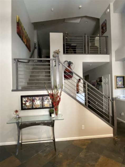 Easy Home Stair Railing Remodel: Install a Striking Metal Railing