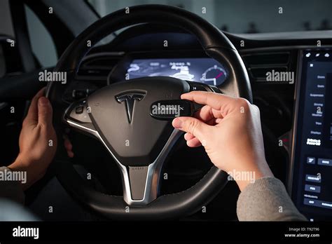 Inside view of Tesla Electric Vehicle. Sreering Wheel and Displays Stock Photo - Alamy