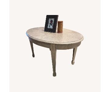 Clayton Oval Wood Coffee Table - AptDeco