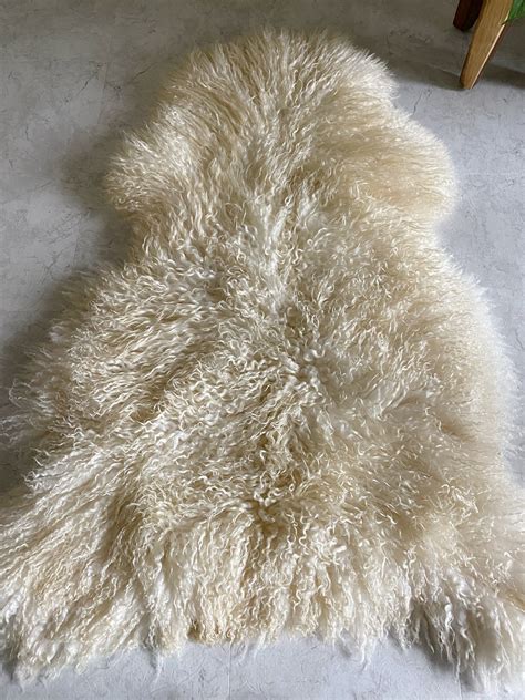 Curly Sheepskins– East Perry