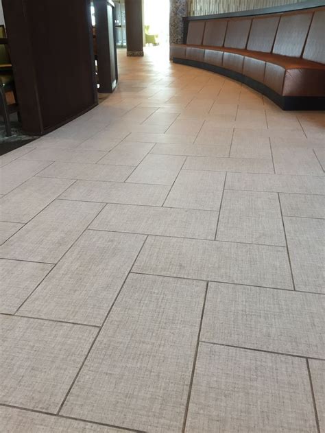 Daltile Exhibition series / EX12 Ecru 12x24. Installed in herringbone ...