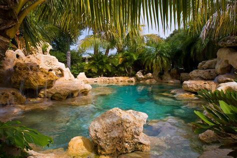 Natural Lagoon swimming pool with sand bottom and waterfalls