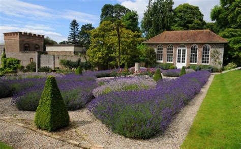 Ugbrooke Park, Chudleigh, Devon. The 18th century Orangery overlooks the parterre with its ...