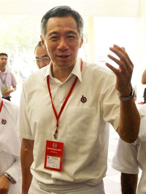 Singapore PM takes pay cut – but his £1.1m is still eight times as much ...