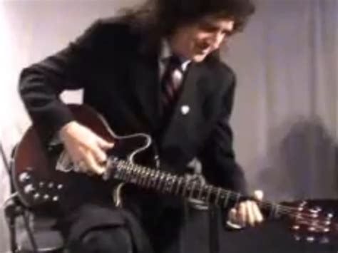 Brian May plays guitar solo during university visit | MusicRadar