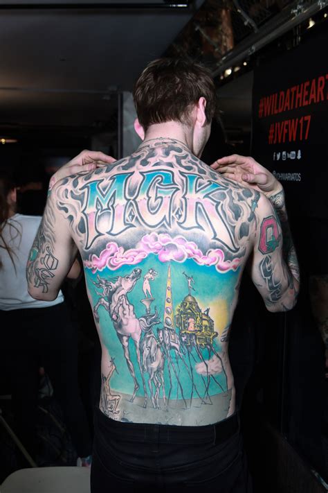 Machine Gun Kelly Tattoos Suspenders - The Meaning Behind 71 Of Machine Gun Kelly S Most Famous ...