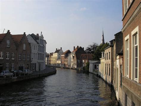 Photo Essay: Beautiful Canals in Bruges, Belgium - Adventurous Kate : Adventurous Kate