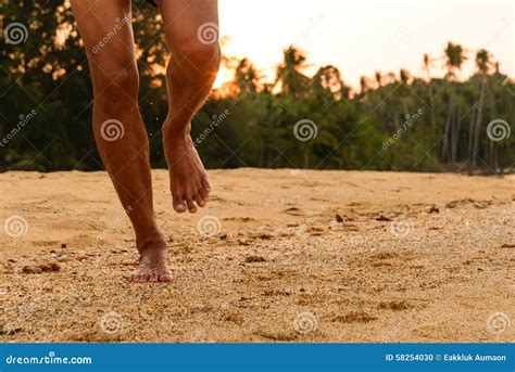 Barefoot Running on Beach at Sunset Stock Photo - Image of feet ...