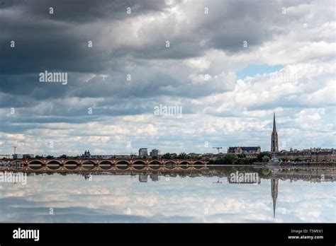 Cityscape of Bordeaux and reflection on water of Garonne River Stock Photo - Alamy