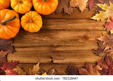 Pumpkins Fall Leaves Over Wooden Background Stock Photo 782128447 ...