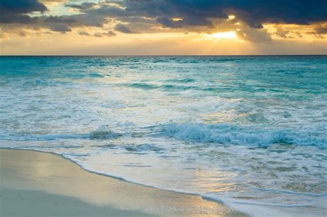 Premium Photo | Sunrise over the beach on caribbean sea.