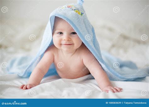 Cute Little Baby Boy, Relaxing in Bed after Bath, Smiling Happily Stock Image - Image of cover ...