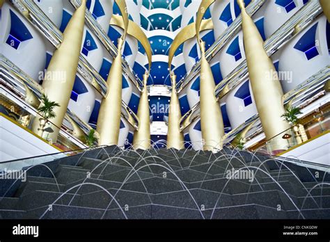 Interior lobby, Burj Al Arab Hotel, Jumeirah, Dubai, United Arab Emirates, decorated with gold ...