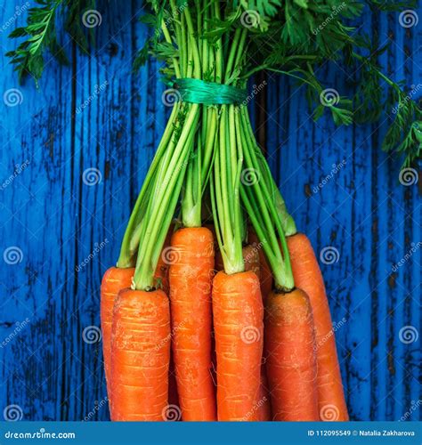 A Bunch of Carrots. Fresh Carrots Heap with Green Stems Stock Image ...