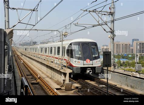 Shanghai metro line 11 train departs from Jiading Xincheng station, Shanghai, China Stock Photo ...