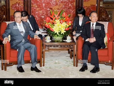 Japanese Prime Minister Yasuo Fukuda, left, meets with Chinese Premier Wen Jiabao in the ...