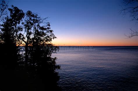 Sunrise over Lake Superior stock image. Image of trees - 203931