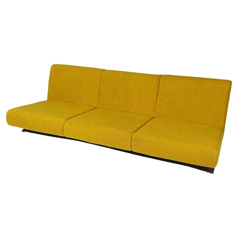 Italian space age Three-seater sofa in yellow fabric and black wood, 1970s For Sale at 1stDibs