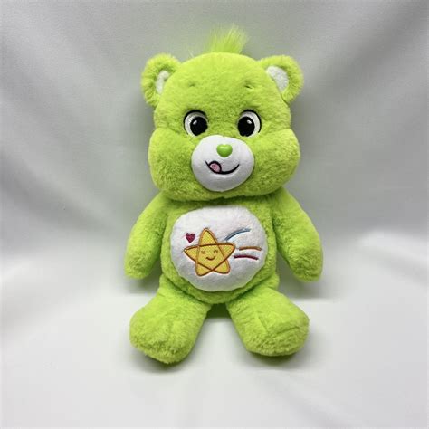 "*This is not an officially released Care Bear* This 14\" bear is customized with a machine ...