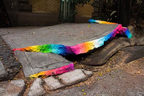 Vibrant Painting on Cracked Sidewalks - Design Swan