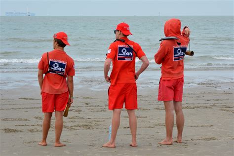 Free Images : beach, sea, coast, sand, people, lifeguard, red, uniform, job, rescuers, endurance ...