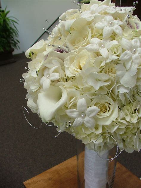 File:White assorted flowers bride bouquet.jpg