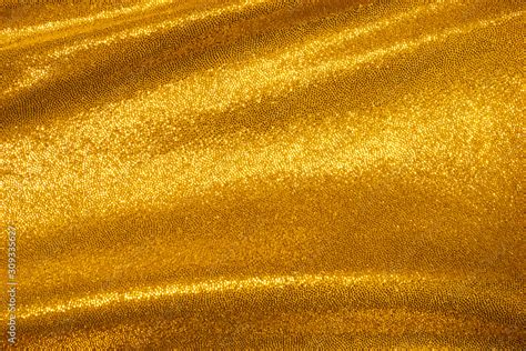 Luxury golden abstract texture and background. Gold wallpaper. ภาพถ่ายสต็อก | Adobe Stock