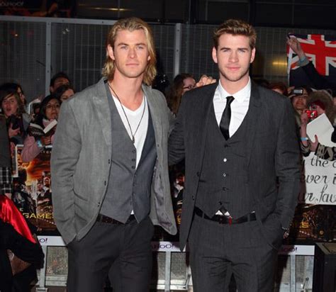 Chris Hemsworth supports his brother Liam at The Hunger Games premiere ...