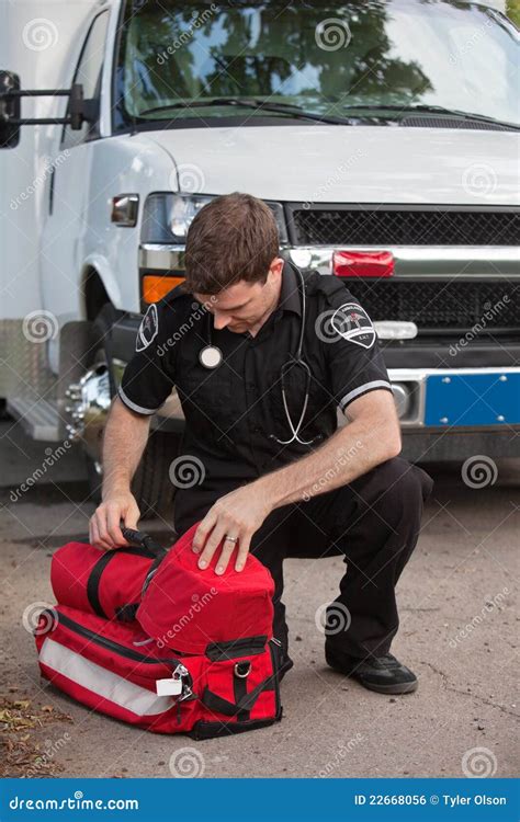 Male Paramedic With Oxygen Unit Royalty Free Stock Image - Image: 22668056