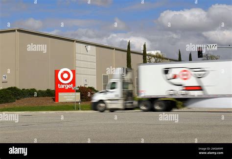 A semi truck drives toward a Target distribution center, Tuesday, March 24, 2020, in Shafter ...