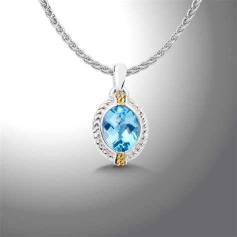 Swiss Blue Topaz Pendant - A brilliant Sterilng Silver and 18K Gold ...