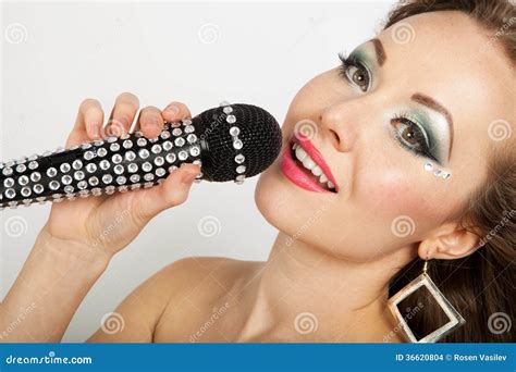 Portrait of a Young Beautiful Woman Singing Stock Photo - Image of indoors, gorgeous: 36620804