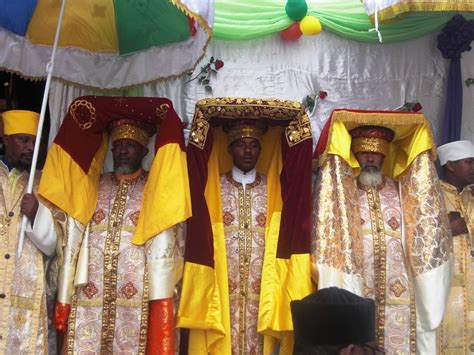 Ethiopian priests carrying wrapped replicas of the Ark of the Covenant on their heads ...