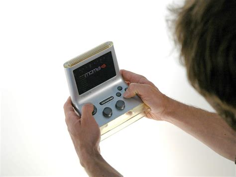 Holding A MOMA Mobile Gaming Console | Holding A MOMA Mobile… | Flickr