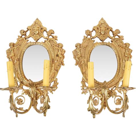 Pair of Vintage Brass Mirrored Sconces With Two Lights from piatik on ...