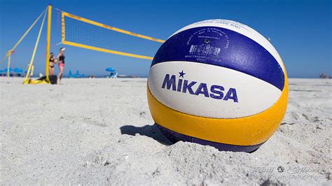 White Blue Yellow Volleyball On Beach Sand In Blue Sky Background ...