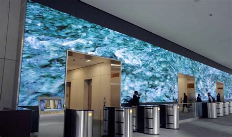 Office video wall on the rise, is this the best office lobby ever? - Business Interiors
