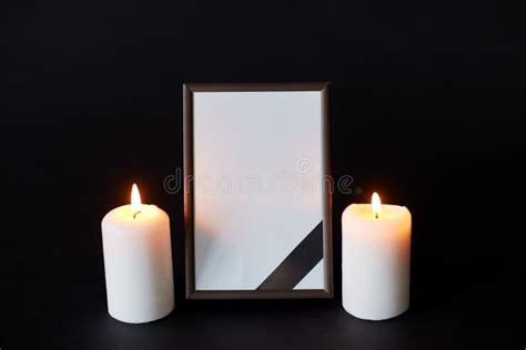 Black Ribbon on Photo Frame and Candles at Funeral Stock Photo - Image of candle, alight: 95088512