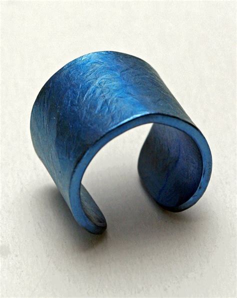 Jewelry from anodized titanium, handcrafted in minimalist fashionable ...