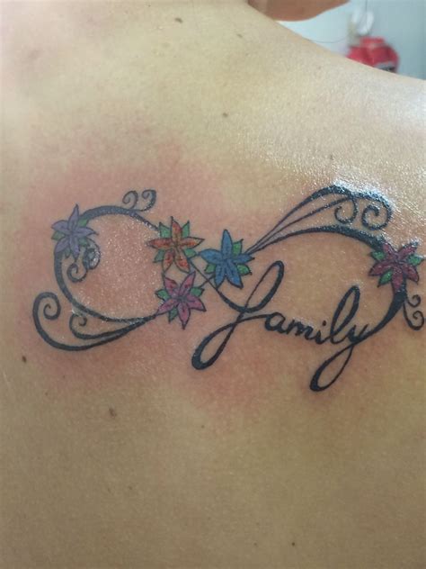 Family infinity tattoo. Each flower represents one of my siblings and 1 ...