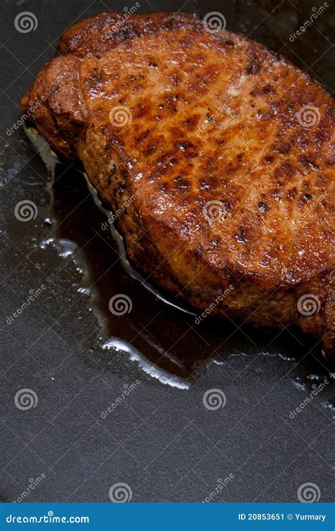 Steak in a frying pan stock image. Image of dinner, cholesterol - 20853651