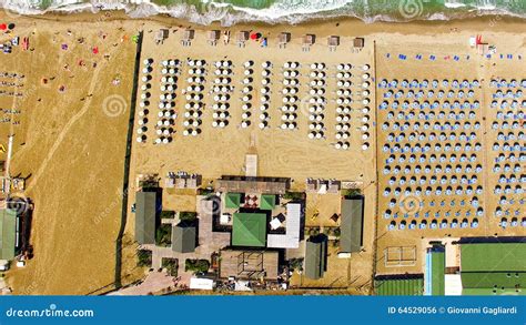 Beautiful Aerial View of Beach Chairs and Umbrellas Along the Ocean Stock Photo - Image of ...