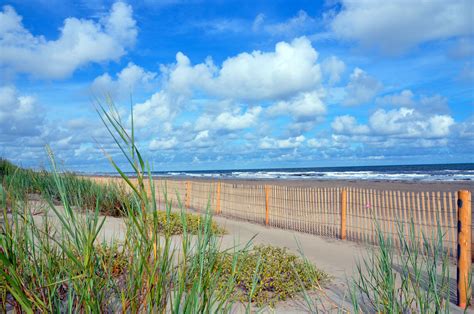 beach-with-fence-large - Grand Isle