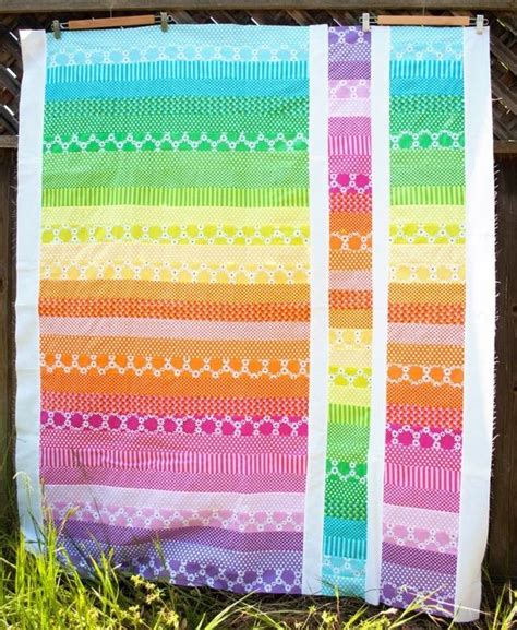 jelly roll quilt, cute and easy!! Love the bright colors for a baby quilt present by selma ...