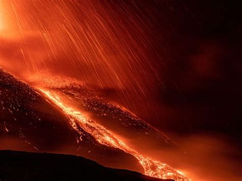 Photos: Italy's Mount Etna lights up night sky in stunning eruption ...